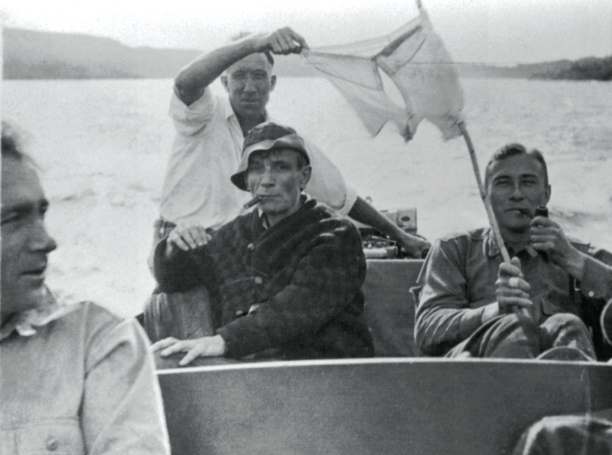 Myron Avery (left), Walter Greene (in hat), Shailer Philbrick (back), and Frank Schairer ride the waves and dry laundry en route to the next section to flag in 1933