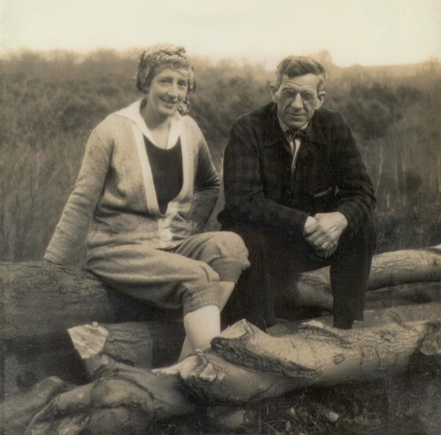 Hazel MacKaye with brother Benton sitting on a log