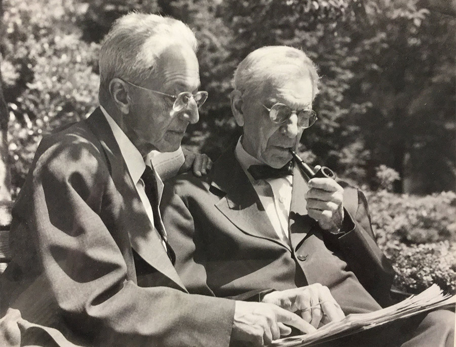 Clarence Stein, left, and Benton MacKaye in 1964 looking at papers together