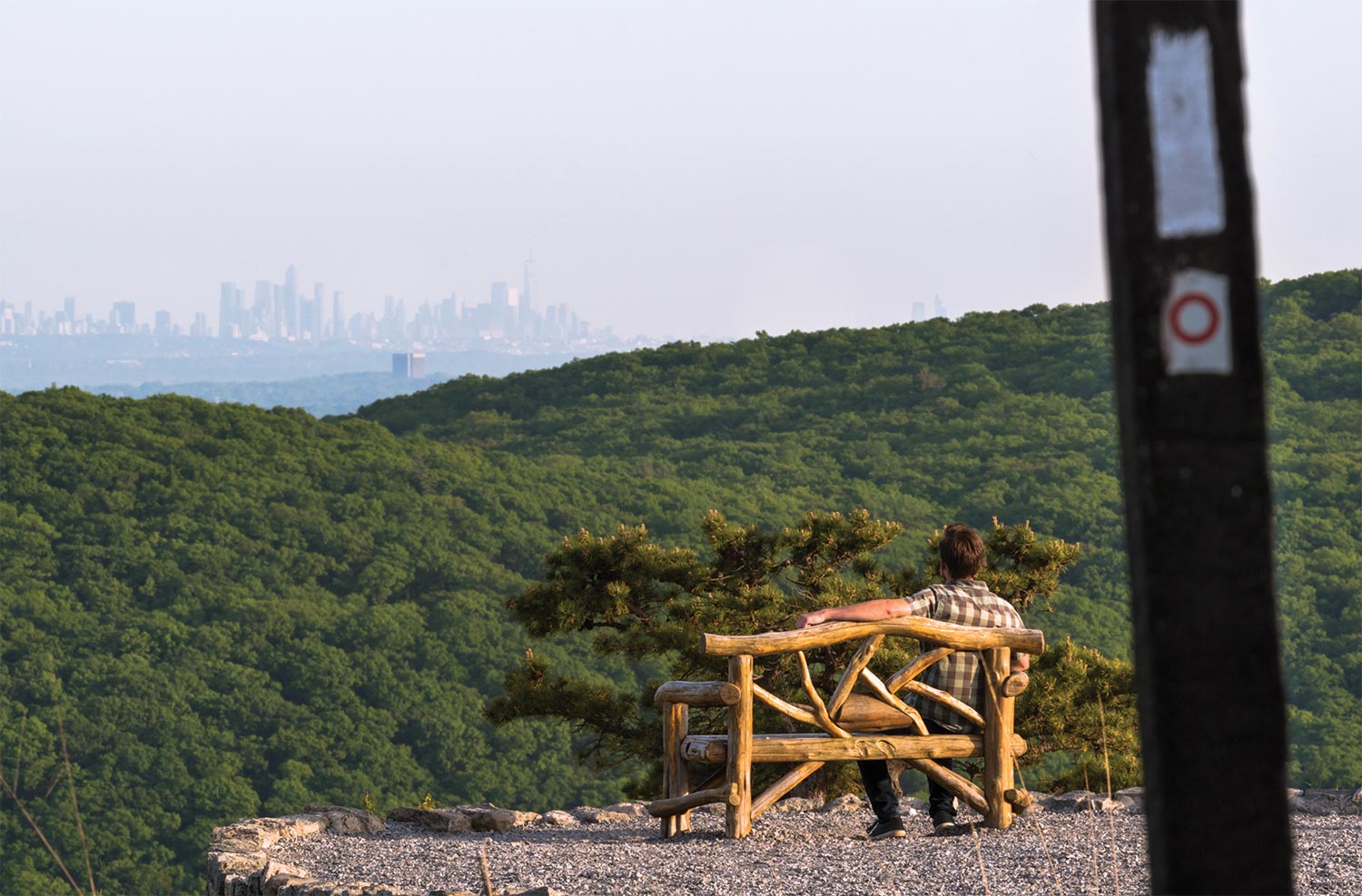 Man enjoying the view from a bench