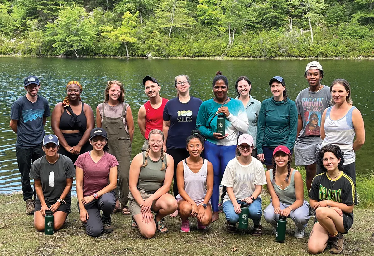 Participants at the 2022 Emerging Leaders Summit on a river shore