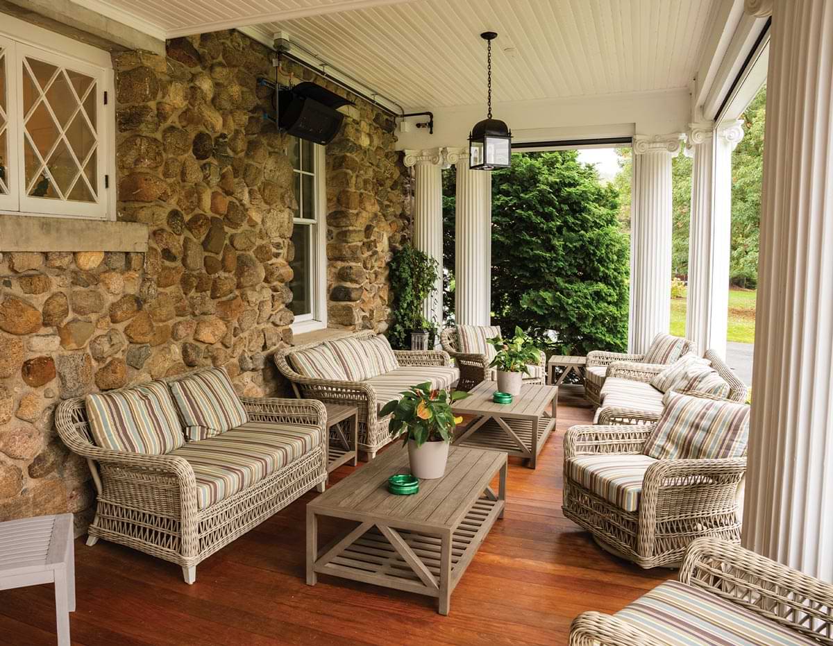 close partial view of the Hudson Farm estate house porch