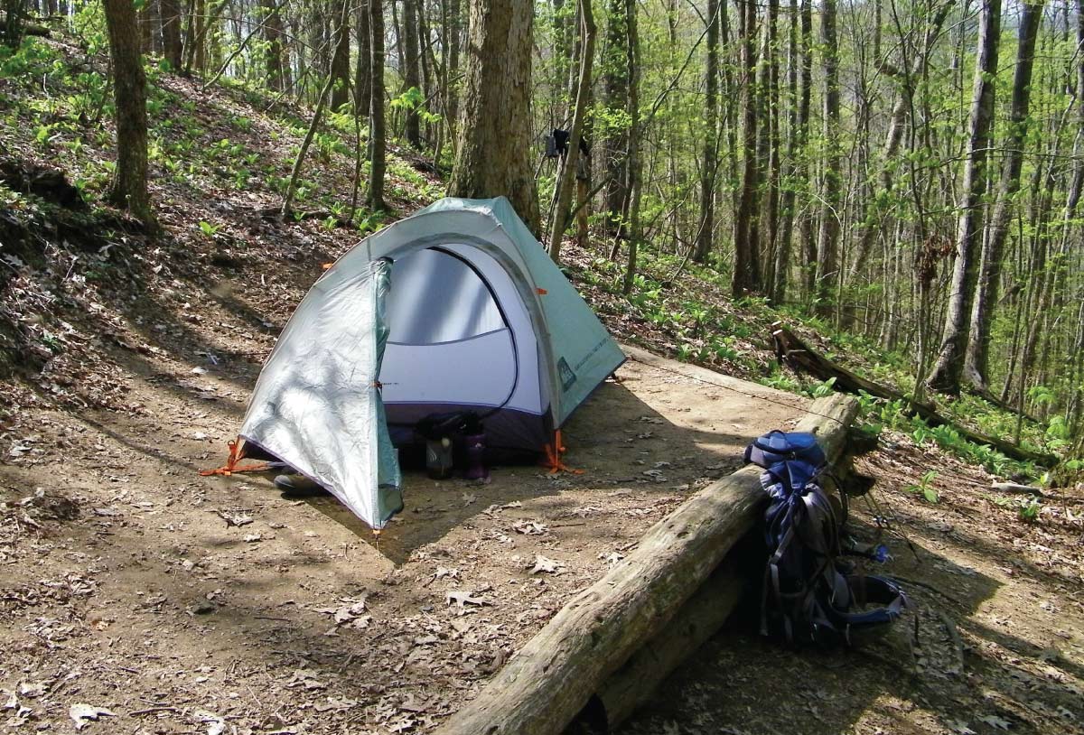 outside view of Earthen tent pads dug into hillsides