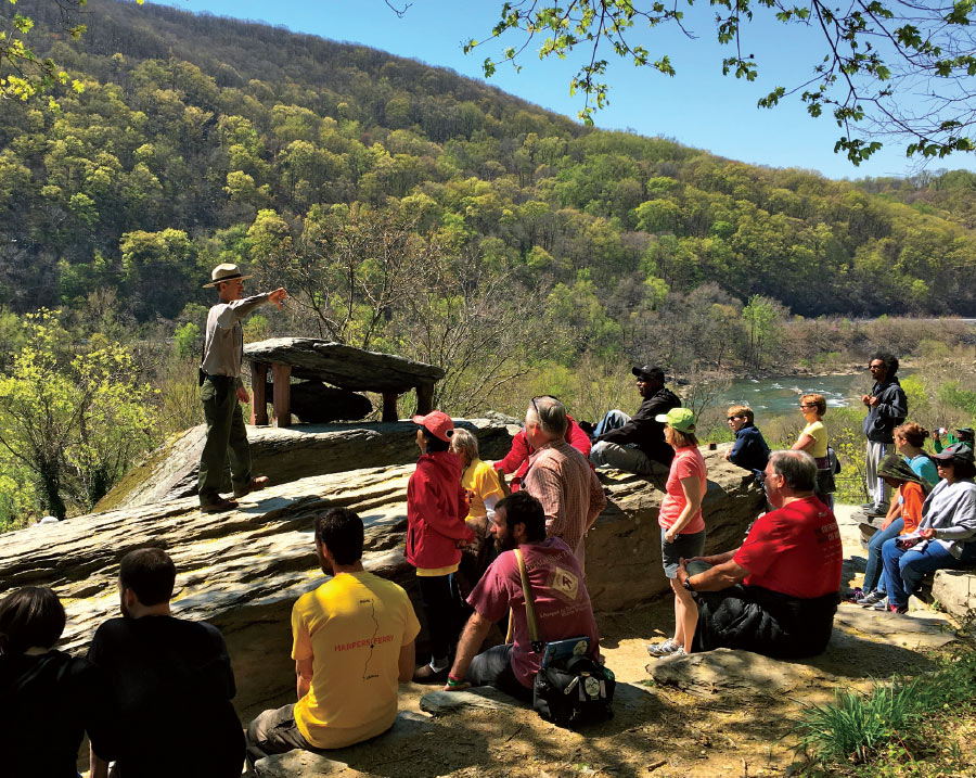 park ranger speaking to group outdoors